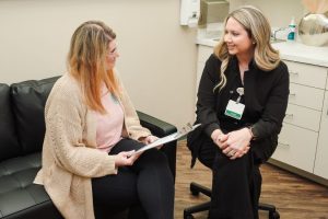 Kelly walking patient through medical weight loss program